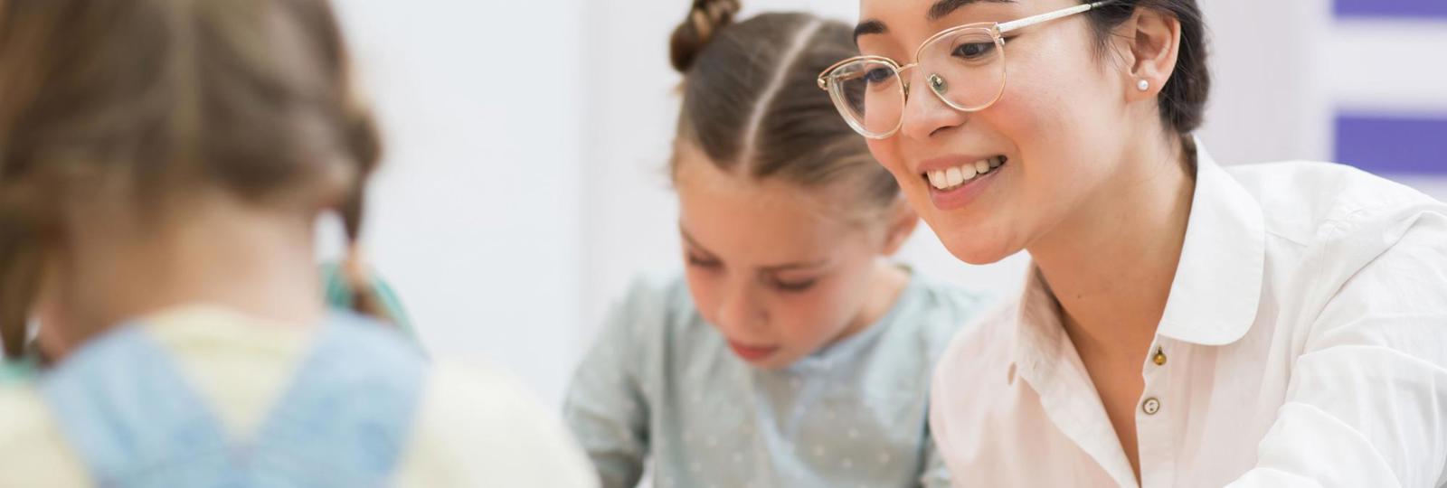 Woman Talking With Her Students During Class